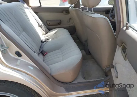 1996 Toyota Corolla from USA, damaged, VIN 2T1BA02E3TC133876